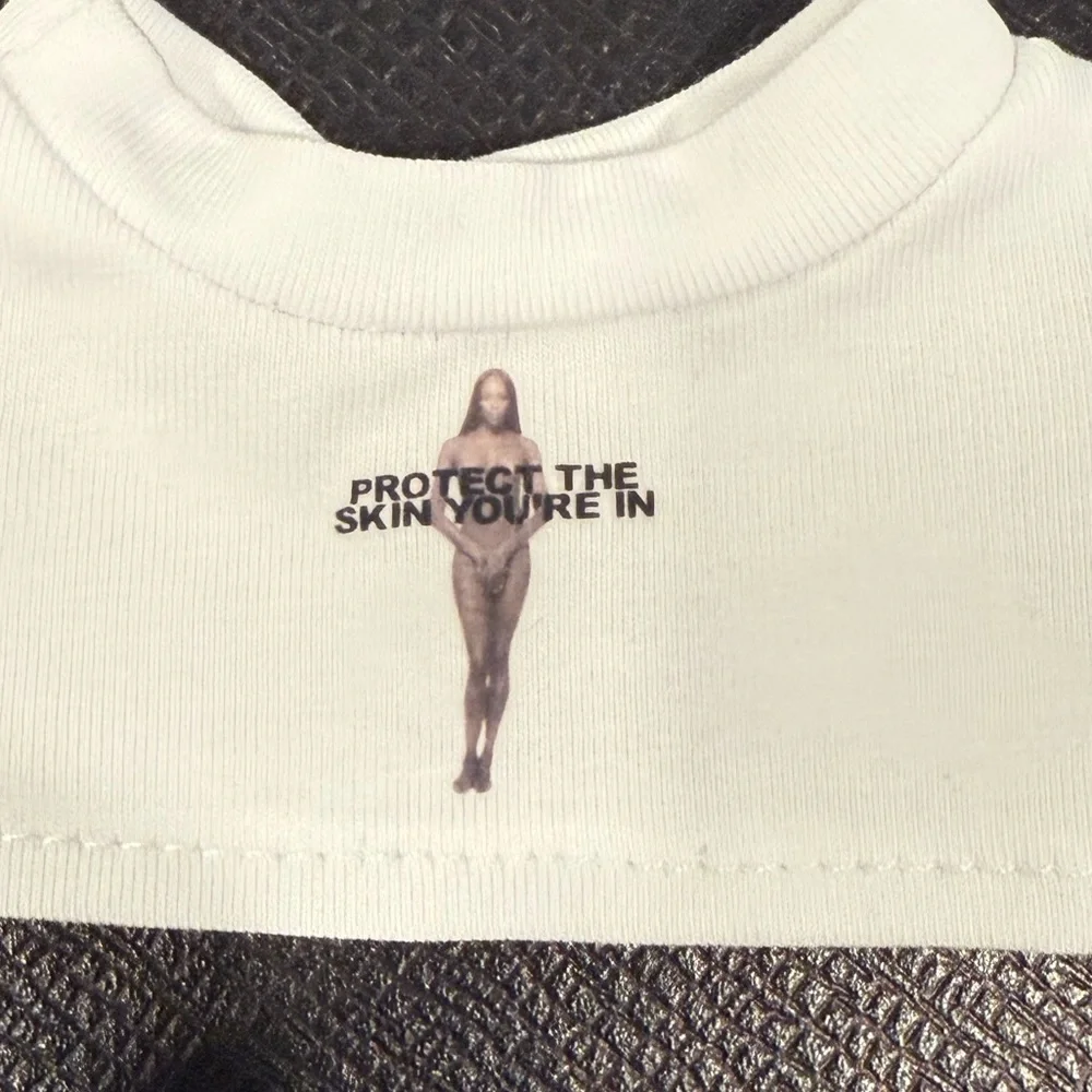 Labubu Marc Jacobs Protect the Skin You’re In T-shirt - Picture 4 of 4